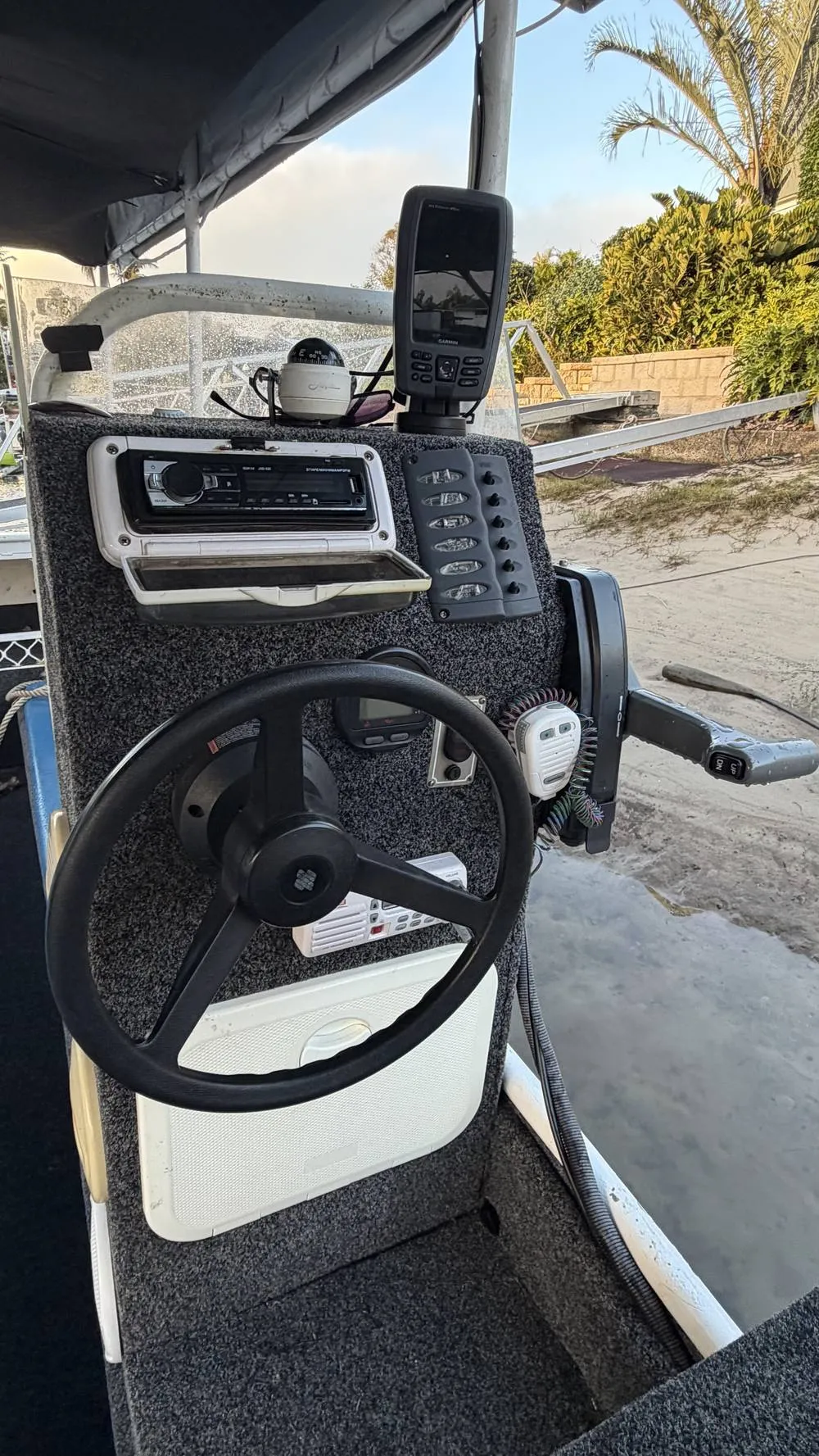 Coral Explorer helm console, GPS sounder and VHF radio, photographed by day